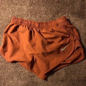 Nike pumpkin mesh-siding running shorts